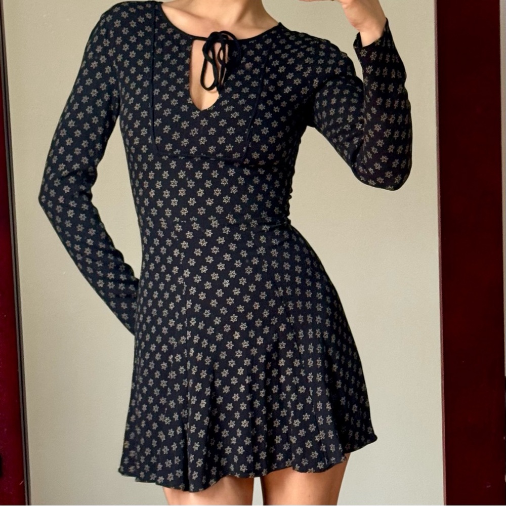Reformation black dress with flower star pattern, size small